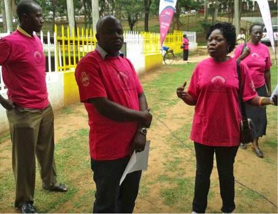 Executive Director of BuildME, Mr. Bwire Deo with other volunteers at health advocacy program